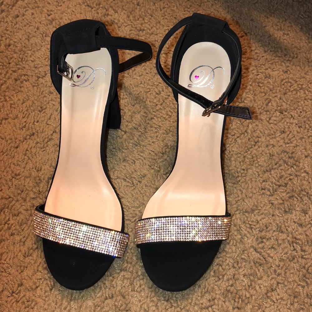 black and jeweled strapped high heels